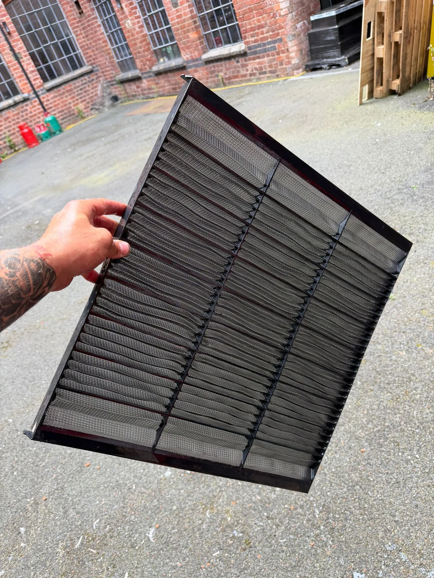 Air conditioning filter cleaned and refitted after servicing by Aervue